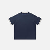 Back view of the blue Retro Oversized Letter Print T-shirt in a gray background
