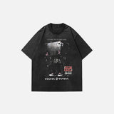 Back view of the black Oversized Vintage Graphic print Washed T-shirt in a gray background