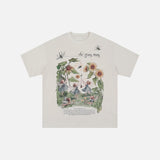 Front view of the beige The Fairy Party T-shirt in a gray background