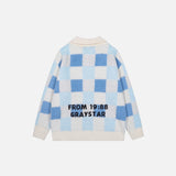 Back view of the blue Y2K Graystar Grid Sweater in a gray background