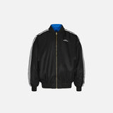 Front view of the black Double-sided Loose Classic Jacket in a gray background 