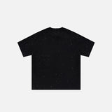 Back view of the black Space End Loose T-shirt in a gray background 
