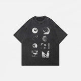 Front view of the black Black Graphic Eyes T-shirt in a gray background