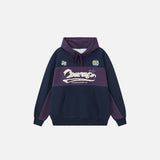 Front view of the purple Retro Vibes Hoodie in a gray background