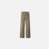 Front view of the brown Desert Drift Denim Jeans in a gray background