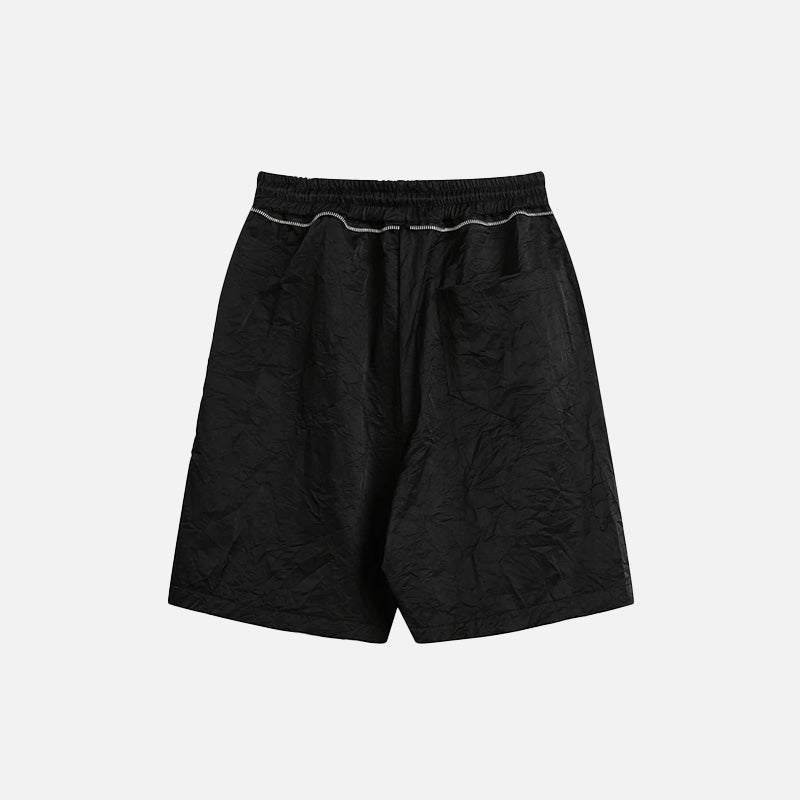 Back view of the black Basic Drawstring Shorts in a gray background