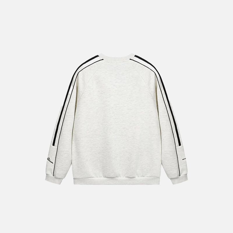 Back view of the white Defiant Stride Sweatshirt in a gray background