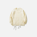 Front view of the beige Solid Color V-Neck Knitted Sweater in a gray background