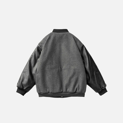 Back view of the dark grey Neoism Varsity Jacket in a gray background