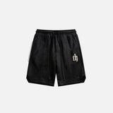 Front view of the black Vintage Cozy Sports Shorts in a gray background