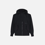 Front view of the black Adventure Nomad Jacket in a gray background