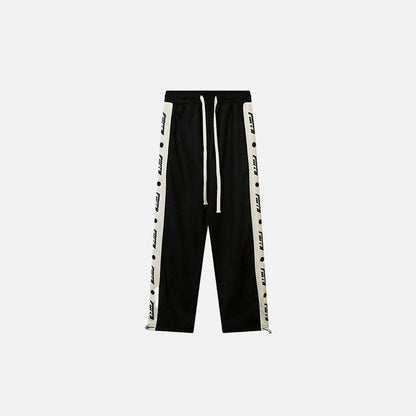 Front view of the black Side Striped High-waist Sweatpants in a gray background 