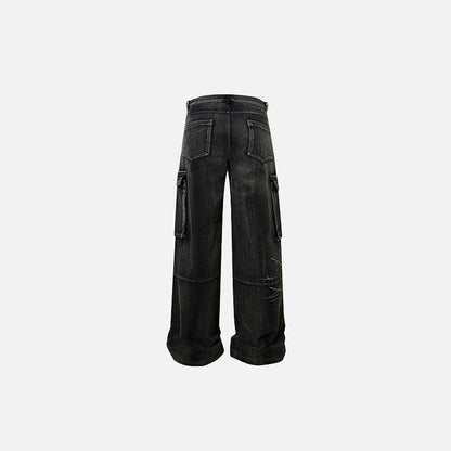 Back view of the black Graffiti Patch Cargo Pants in a gray background