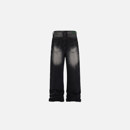 Back view of the Washed Black Loose Jeans in a gray background 