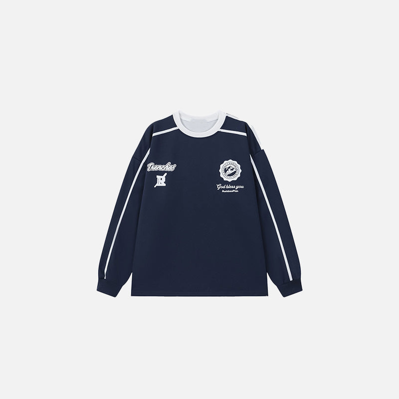 Front view of the navy blue Iconic Insignia Sweater in a gray background