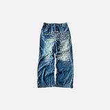 Front view of the blue Whispered Denim Elegance Jeans in a gray background