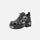 Front view of the black Gothic Platform Buckle Shoes in a gray background