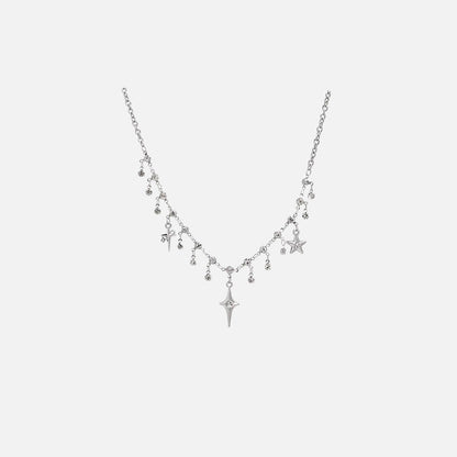 Front view of the Y2K Starburst Necklace in a gray background