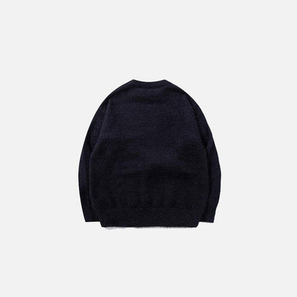 Back view of the black Graphic Bear Embroidered Sweater in a gray background