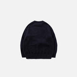 Back view of the black Graphic Bear Embroidered Sweater in a gray background