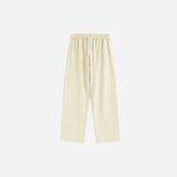 Front view of the beige Drawstring Wide-Leg Pants in a gray background