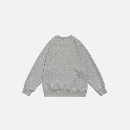 Back view of the grey beige Number 9 Embroidered Sweatshirt in a gray background