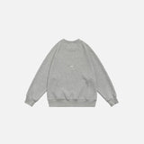 Back view of the grey beige Number 9 Embroidered Sweatshirt in a gray background