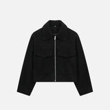 Front view of the black Quilted Utility Jacket in a gray background