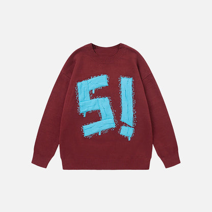Front view of the red Y2K Bold Impact Sweater in a gray background