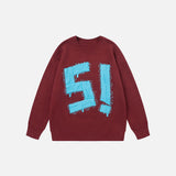 Front view of the red Y2K Bold Impact Sweater in a gray background