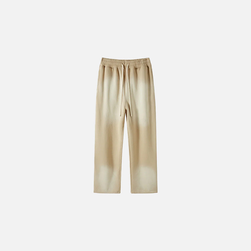 Front view of the beige Casual Noir Relax Pants in a gray background