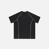 Front view of the black Loose Patchwork Oversized T-shirt in a gray background 