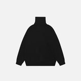 Back view of the black Y2k Letter Embroidery Oversized Sweater in a gray background 