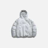 Front view of the white Cross-Zip Quilted Jacket in a gray background