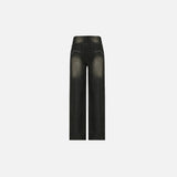 Front view of the black Rebel Thigh-Slash Jeans in a gray background