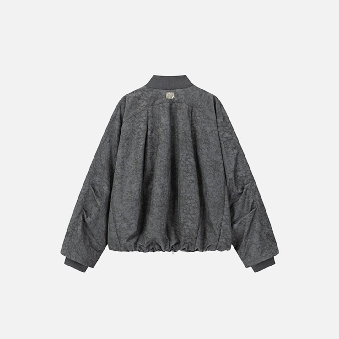 Back view of the dark gray Charcoal Classic Jacket in a gray background