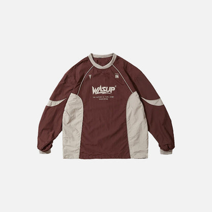 Front view of the red gray Tech Performance Pullover Sweatshirt in a gray background