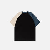 Back view of the black Color Block Retro Patchwork T-shirt in a gray background 
