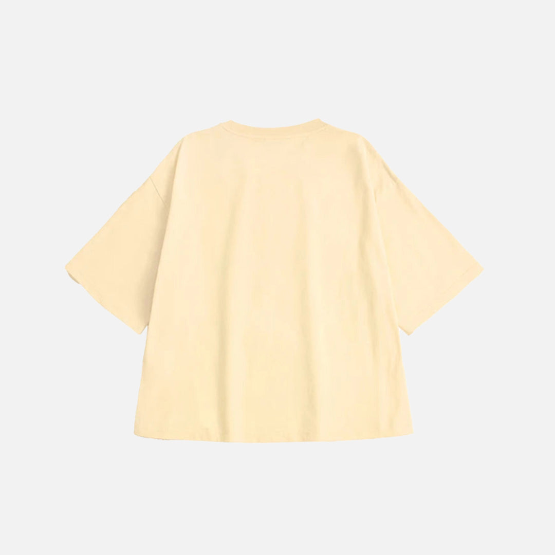 Back view of the apricot Emoji Cash Statement T-Shirt in a gray background