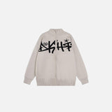 Front view of the grey DSHFT Graffiti Zip-Up Sweater in a gray background