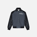 Front view of the grey Loose Patchwork Contrast Color Jacket in a gray background 