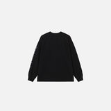 Back view of the black Urban Spikes Long Sleeve T-shirt in a gray background