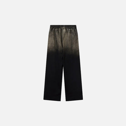 Back view of the black Casual Loose Gradient Jogger Pants in a gray background