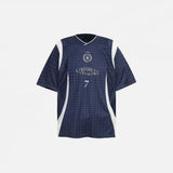 Front view of the blue Vintage Patchwork Sports Graphic T-Shirt in a gray background