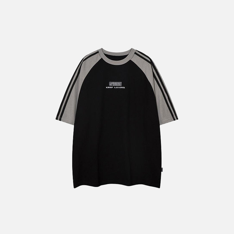 Front view of the black Loose Side Striped T-shirt in a gray background 