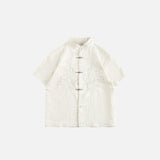 Front view of the beige Classic Mandarin Embroidered Shirt in a gray background