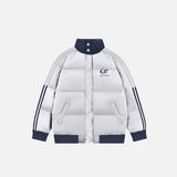Front view of the grey Classic Loose Puffer Jacket in a gray background 