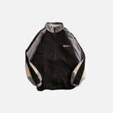 black color of the Patchwork Color Block Thin Jacket in a gray background 
