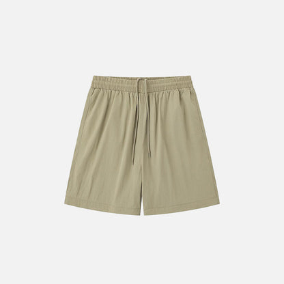 Front view of the khaki Loose Solid Color Sports Shorts in a gray background 