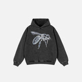 Front view of the black Y2K Insect Embroidered Hoodie in a gray background